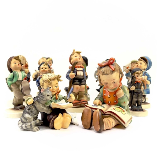 898 - A collection of seventeen Hummel porcelain figures. Including Merry Wanderer in sizes, For Father, P... 