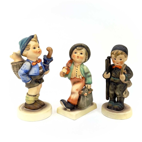 898 - A collection of seventeen Hummel porcelain figures. Including Merry Wanderer in sizes, For Father, P... 