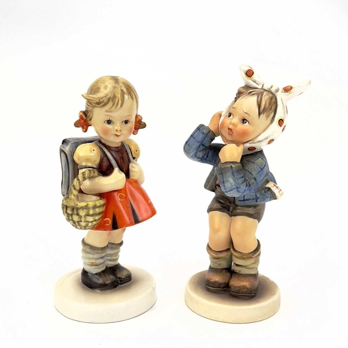 898 - A collection of seventeen Hummel porcelain figures. Including Merry Wanderer in sizes, For Father, P... 