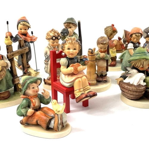 899 - A collection of seventeen Hummel porcelain figures. Including Skier, Just Dozing, Good Friends, Lazy... 