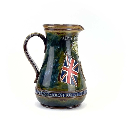 905 - A Doulton Lambeth commemorative jug circa 1900. Inscribed In commemoration of the hoisting of the fl... 