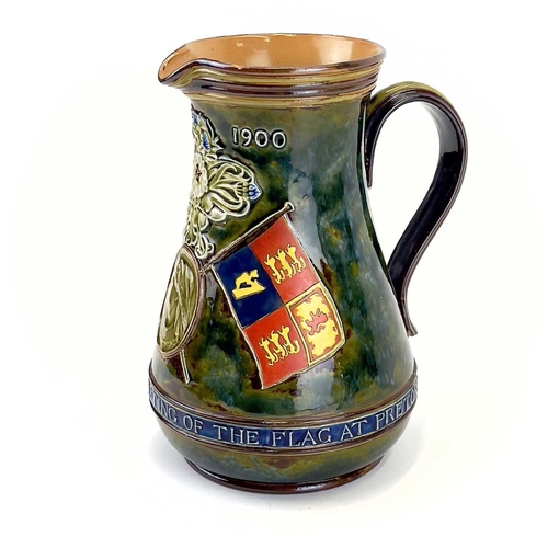 905 - A Doulton Lambeth commemorative jug circa 1900. Inscribed In commemoration of the hoisting of the fl... 