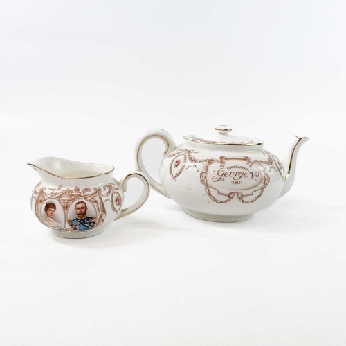 909 - An early 20th century Royal Doulton George V coronation teapot and cover. Together with various othe... 