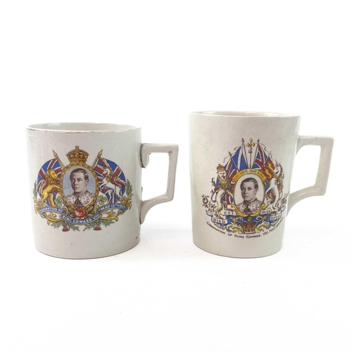 911 - A King George V coronation mug designed and modelled by Dame Laura Knight. Height 8cm together with ... 