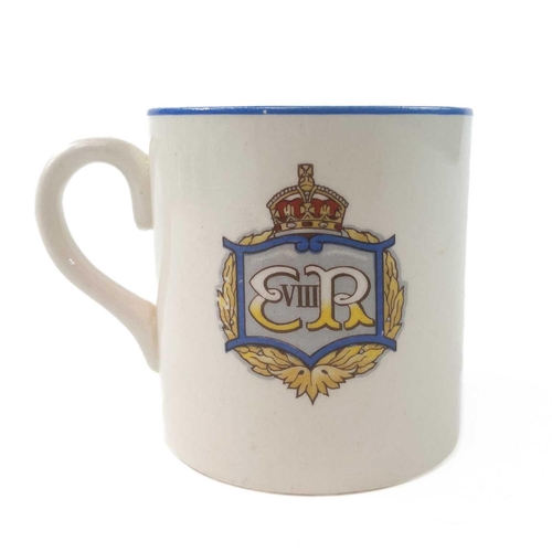 911 - A King George V coronation mug designed and modelled by Dame Laura Knight. Height 8cm together with ... 