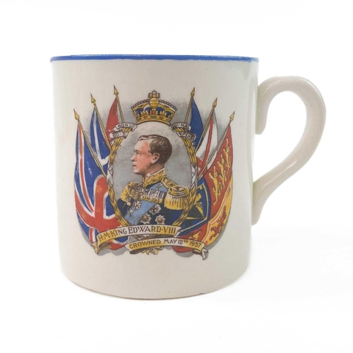 911 - A King George V coronation mug designed and modelled by Dame Laura Knight. Height 8cm together with ... 