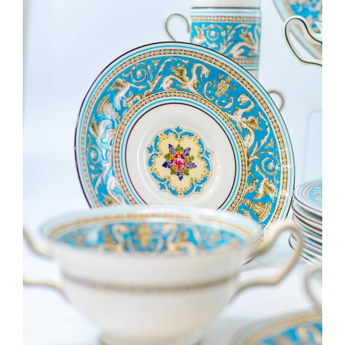 921 - A Wedgwood 'Florentine' dinner and coffee service. Comprising eight dinner plates, eight breakfast/l... 