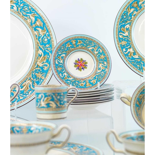 921 - A Wedgwood 'Florentine' dinner and coffee service. Comprising eight dinner plates, eight breakfast/l... 