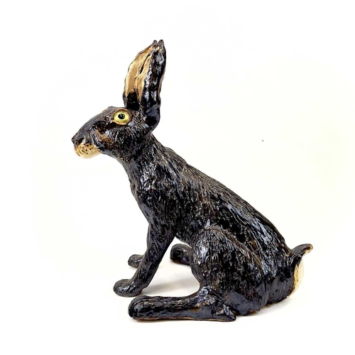 926 - Lyn DAVEY Hare Ceramic sculpture with bronze glaze Signed with initials Height 38cm, length 34cm