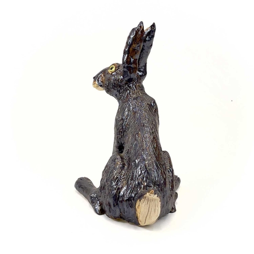 926 - Lyn DAVEY Hare Ceramic sculpture with bronze glaze Signed with initials Height 38cm, length 34cm