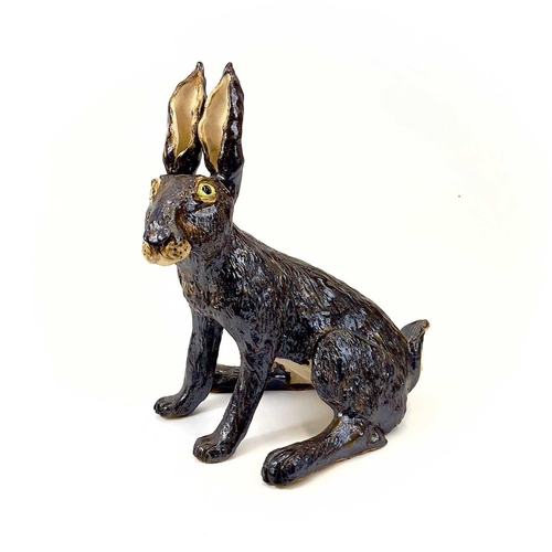 926 - Lyn DAVEY Hare Ceramic sculpture with bronze glaze Signed with initials Height 38cm, length 34cm