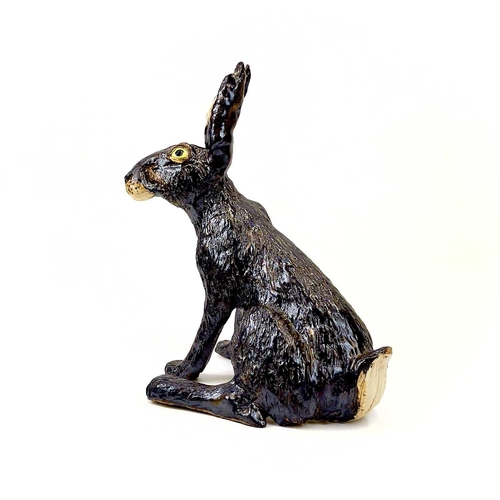 926 - Lyn DAVEY Hare Ceramic sculpture with bronze glaze Signed with initials Height 38cm, length 34cm