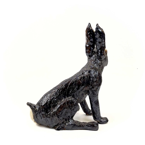 926 - Lyn DAVEY Hare Ceramic sculpture with bronze glaze Signed with initials Height 38cm, length 34cm