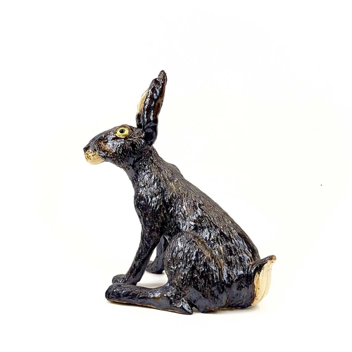 926 - Lyn DAVEY Hare Ceramic sculpture with bronze glaze Signed with initials Height 38cm, length 34cm