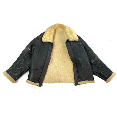 93 - A Second World War RAF black leather and sheepskin flying jacket. .