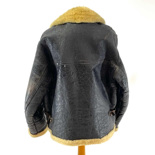 93 - A Second World War RAF black leather and sheepskin flying jacket. .