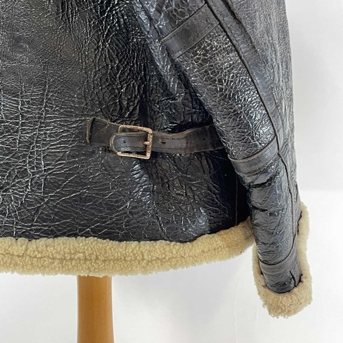 93 - A Second World War RAF black leather and sheepskin flying jacket. .