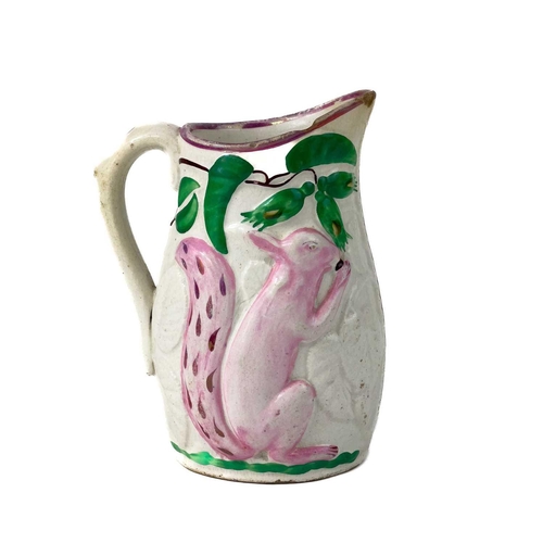 934 - A 19th-century Staffordshire porter mug moulded with processional exotic animals. Height 11cm, toget... 