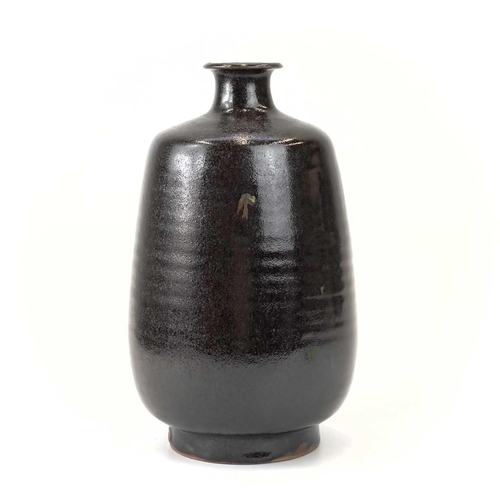 939 - A Jacob Bodilly studio pottery vase. With a tenmoku glaze, applied seal mark, height 29cm.