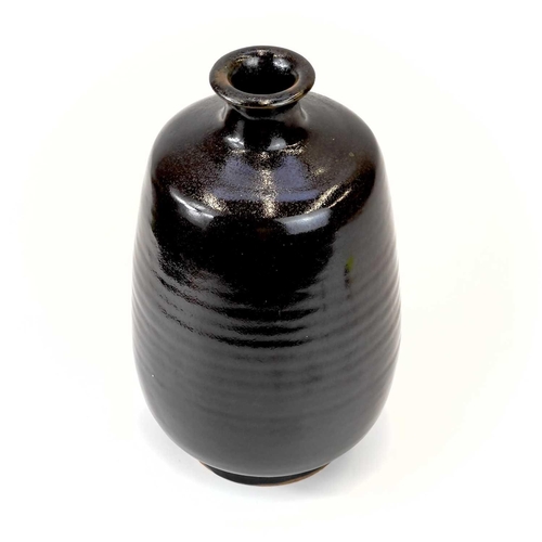 939 - A Jacob Bodilly studio pottery vase. With a tenmoku glaze, applied seal mark, height 29cm.