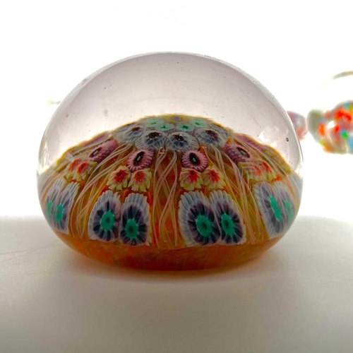 952 - A Whitefriars controlled bubble paperweight. Together with nine other paperweights.(10)