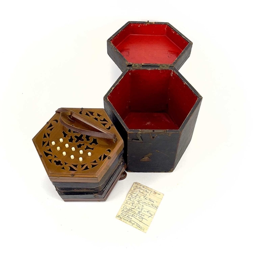 97 - A Mayonburg, Leipzig 21 key concertina and case. With pierced walnut fret, bone keys and 'Extra broa... 