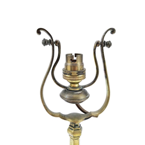 99 - A ships brass wall mounted gimbal lamp. Length 27cm.