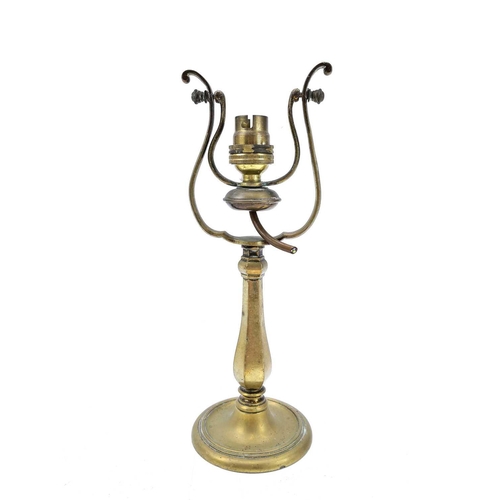 99 - A ships brass wall mounted gimbal lamp. Length 27cm.