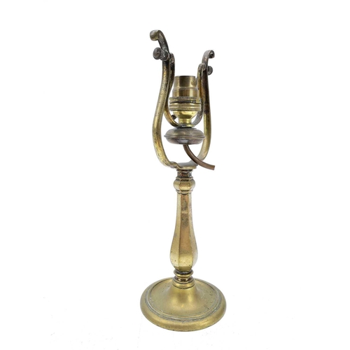 99 - A ships brass wall mounted gimbal lamp. Length 27cm.