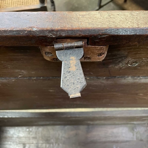 10 - A 17th century boarded oak coffer, probably West Country. The plank top and sides with scalloped edg... 