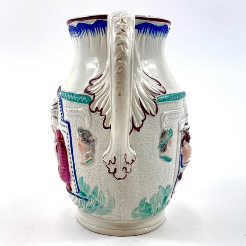 11 - A Staffordshire pearlware Pratt-type jug. Circa 1800, with relief moulded and painted decoration of ... 