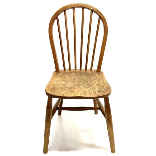 19 - A set of six ash, beech and elm Utility chairs. With hooped stick backs and turned legs (6).