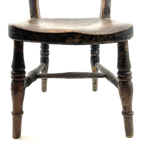 4 - An Oxford type stained ash and elm child's Windsor chair. Circa 1900, with bar back and solid seat, ... 