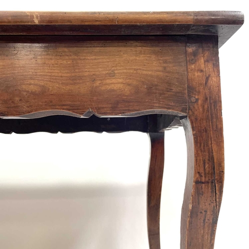 35 - A French fruitwood farmhouse kitchen table. Circa 1820, with cleated three plank top, shaped frieze ... 