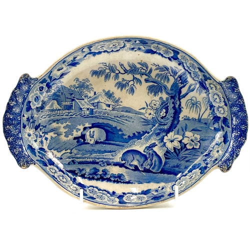 44 - A John Rogers & Son oval blue and white dish printed rabbits grazing. Circa 1830, width 25.5cm, toge... 