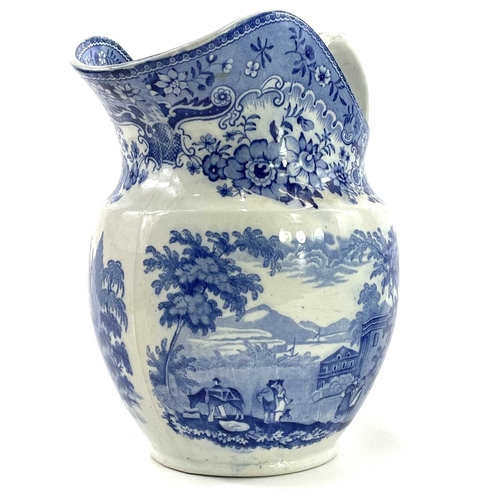 45 - A blue and white Chinoiserie printed porcellanous jug, With lion mask spout, circa 1840, height 15.5... 