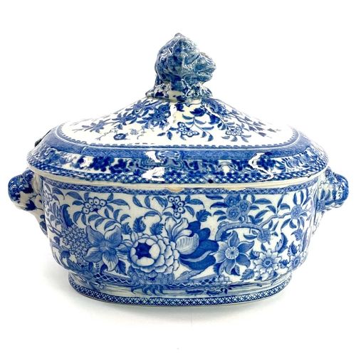 45 - A blue and white Chinoiserie printed porcellanous jug, With lion mask spout, circa 1840, height 15.5... 