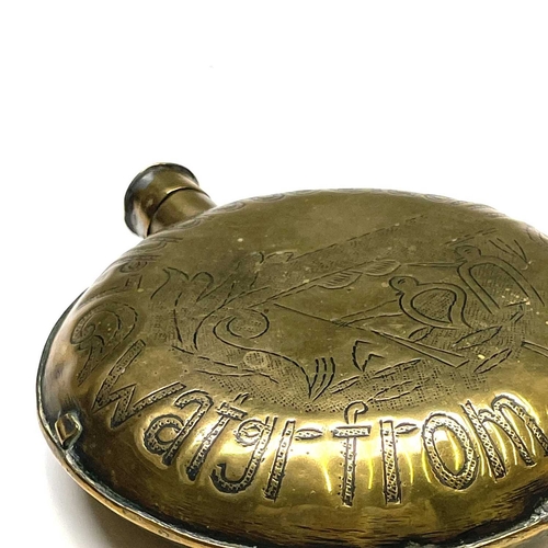 46 - An Anglo Dutch brass flask. Early 19th century, the cover inscribed 'Good Samaritin Inn', 13.5 x 11.... 