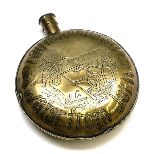 46 - An Anglo Dutch brass flask. Early 19th century, the cover inscribed 'Good Samaritin Inn', 13.5 x 11.... 