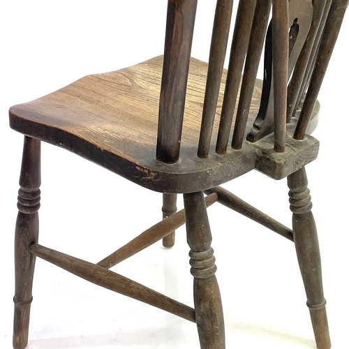 47 - An ash and elm wheelback chair. 19th century, branded B.