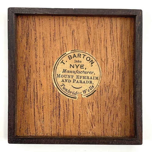 51 - A Tunbridge ware Tangram small puzzle box. With inlaid lid and labelled to the underside for T Barto... 