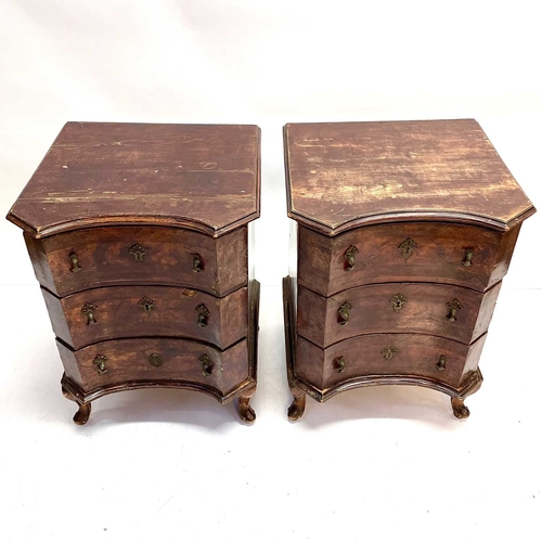 60 - A pair of continental walnut small chests. Circa 1800, each fitted three drawers with concave moulde... 