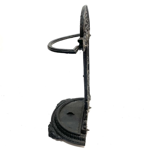 254 - A Victorian cast iron stick stand. Height 74cm.