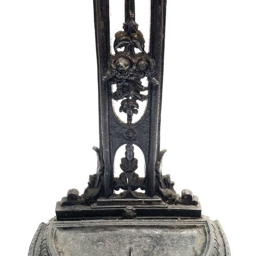 254 - A Victorian cast iron stick stand. Height 74cm.