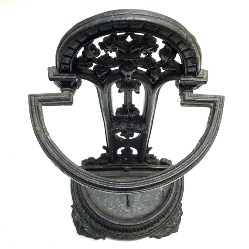 254 - A Victorian cast iron stick stand. Height 74cm.