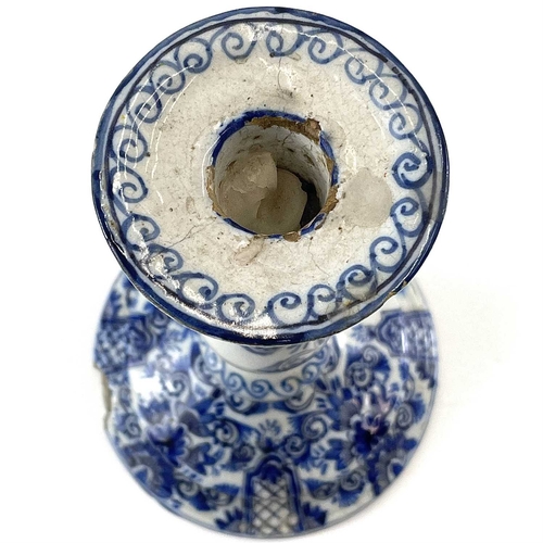 256 - A late eighteenth century delft candle holder. Height 22cm.