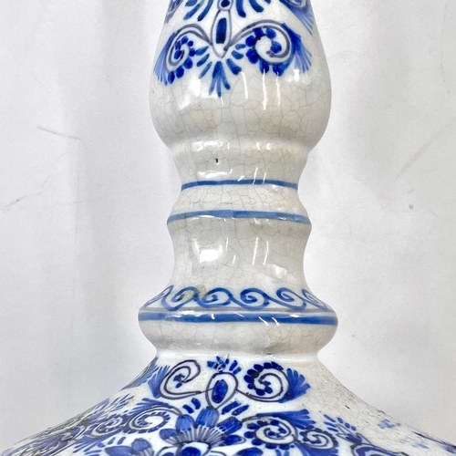 256 - A late eighteenth century delft candle holder. Height 22cm.