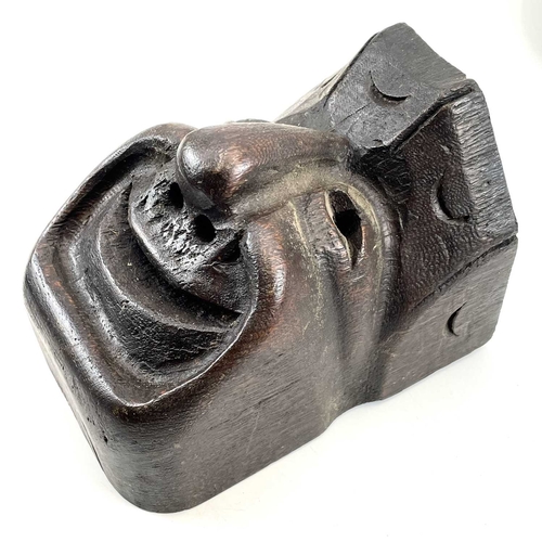 258 - An oak carved mask of a smiling man. Together with various wood carved items and pewter.