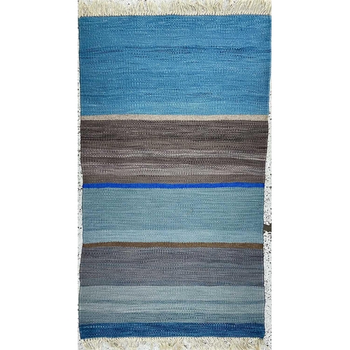 18 - Breon O'CASEY (1928-2011) Untitled  Handwoven rug Length 183 cm, including tassels Maximum width 100... 