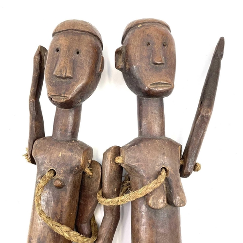 428 - 20th Century East African Nyamweze marionette twins from the studio of John Miller. 57cm in height. ... 